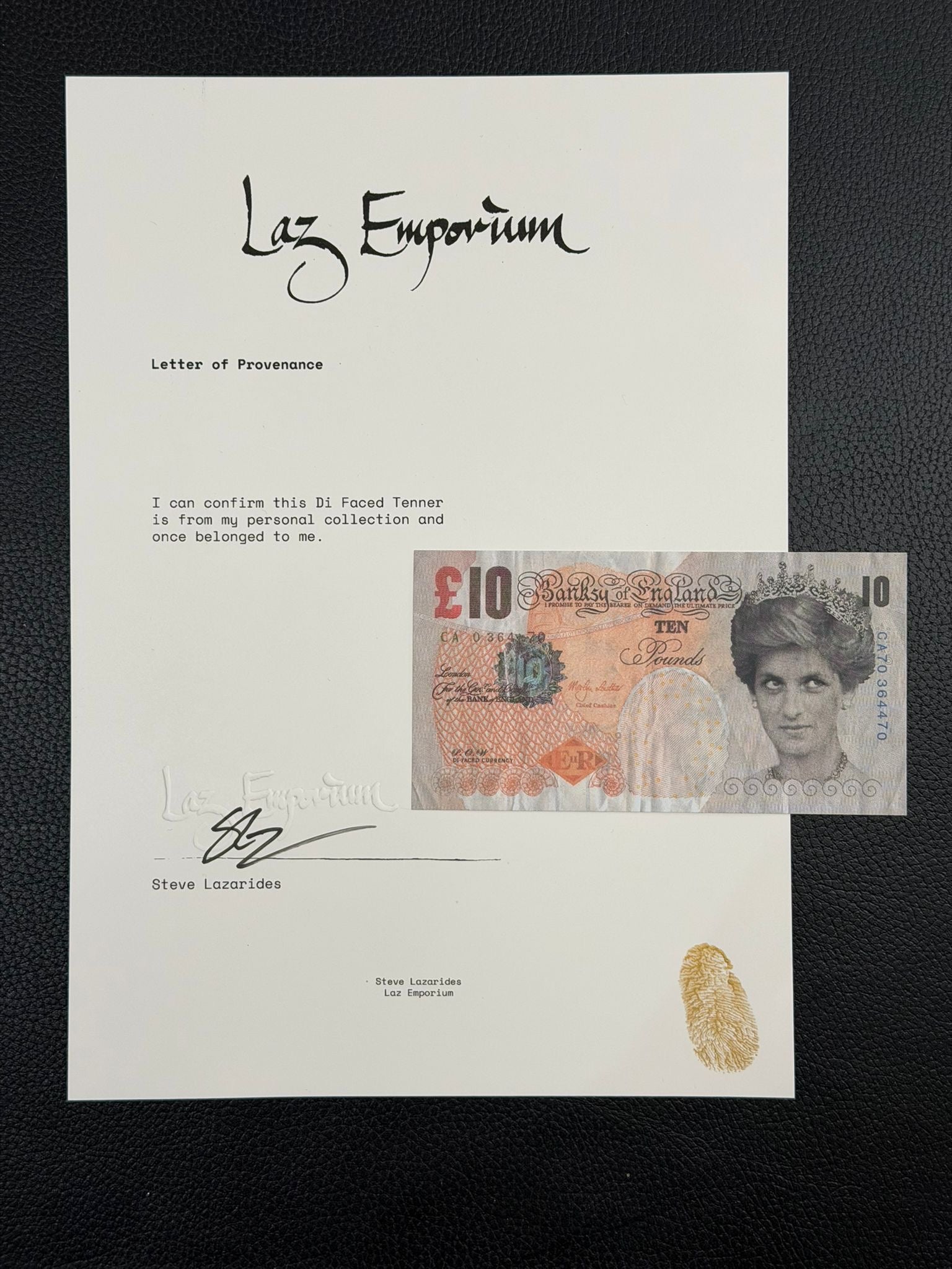 Letter of Provenance for Banksy Di-faced tenner. Signed by Banksy's ex manager. 0 signature and thumb print stamp on a black background.