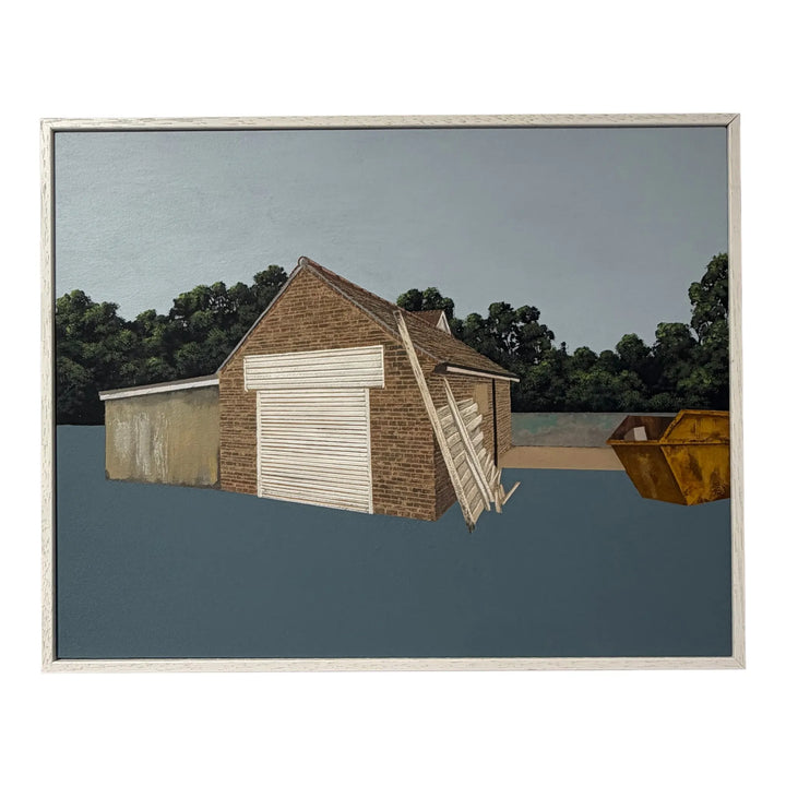 Framed artwork of a two-story building with a garage door against a blue background