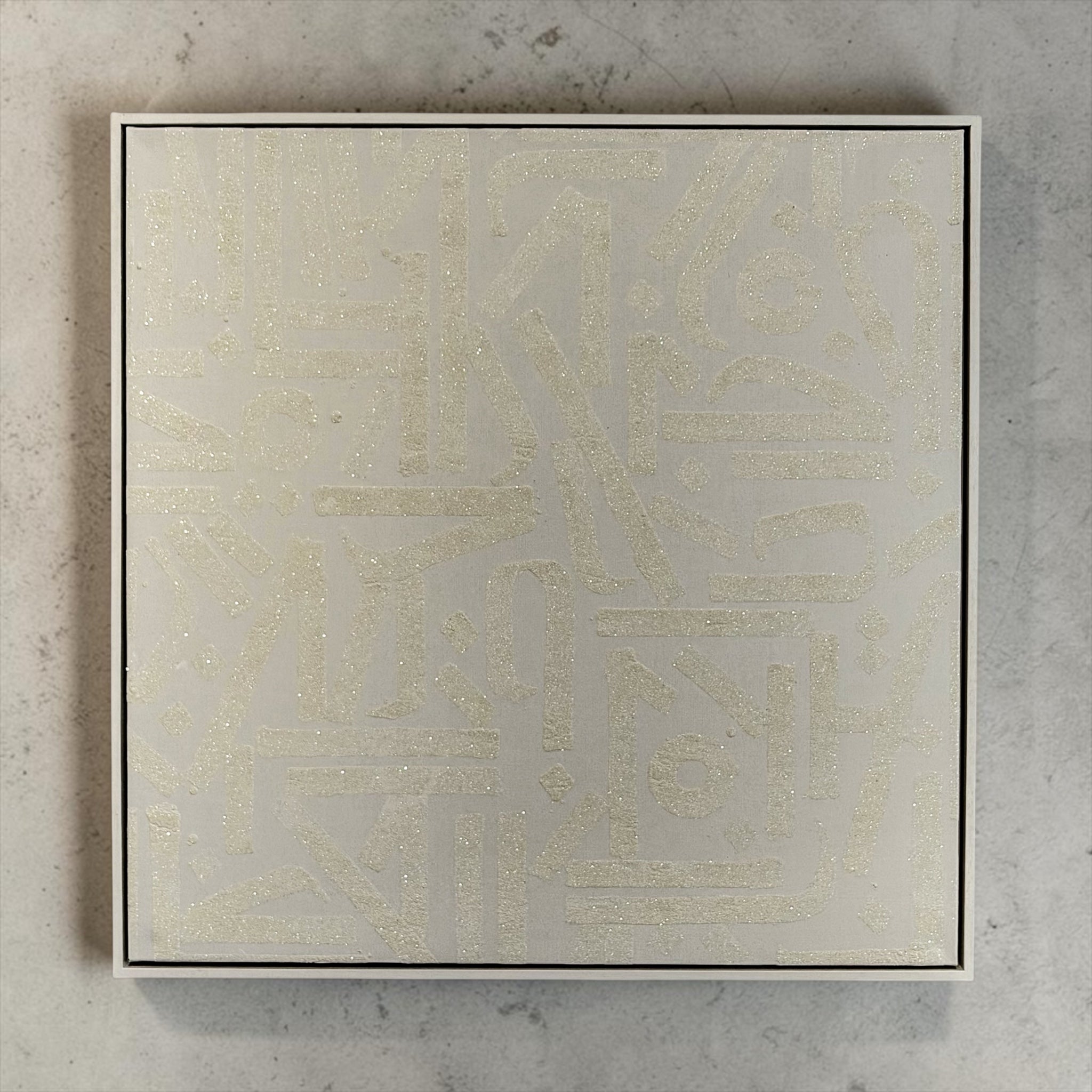 Kate Paul canvas on a grey wall