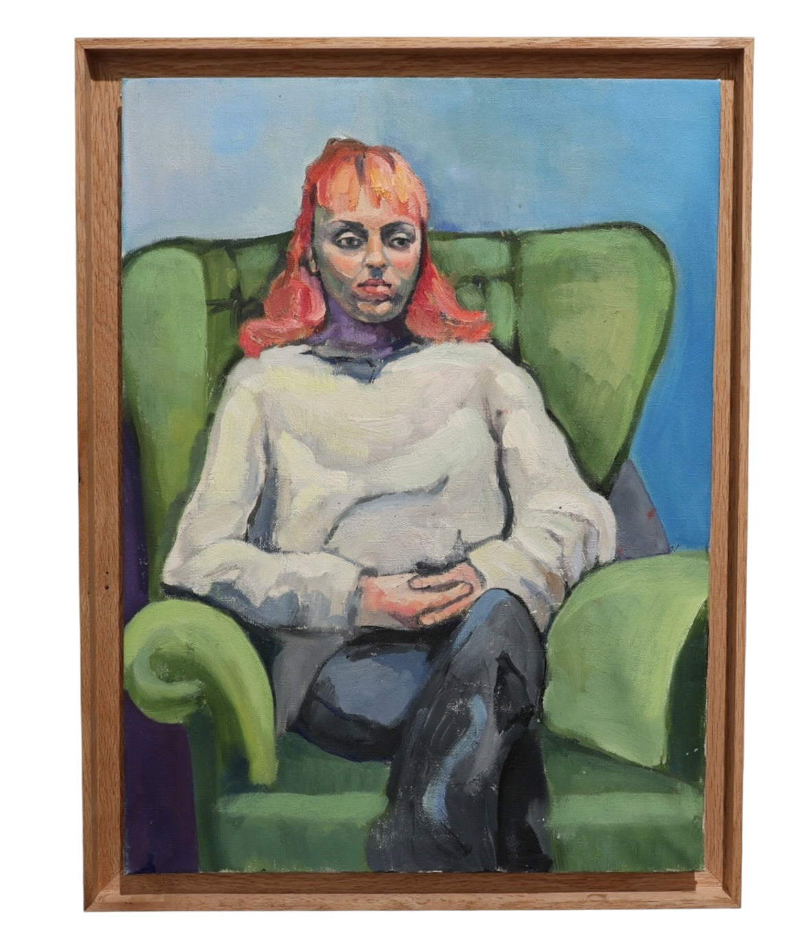 A framed painting depicting a seated figure with orange-red hair, a white top, and dark pants on a green armchair against a blue background, enclosed in a light wood frame.