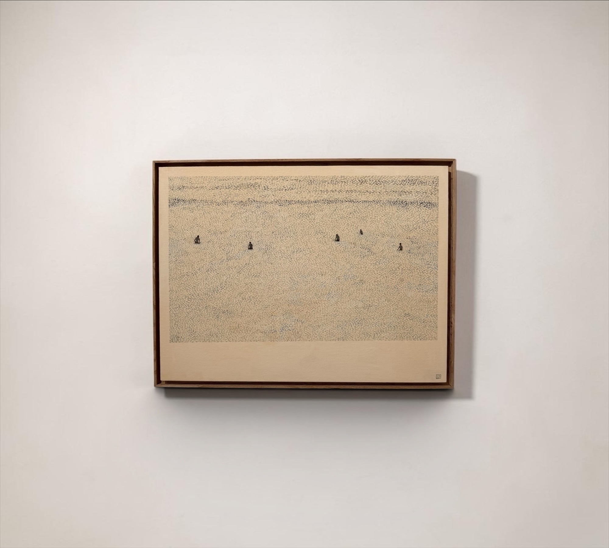 Framed artwork on a plain wall
