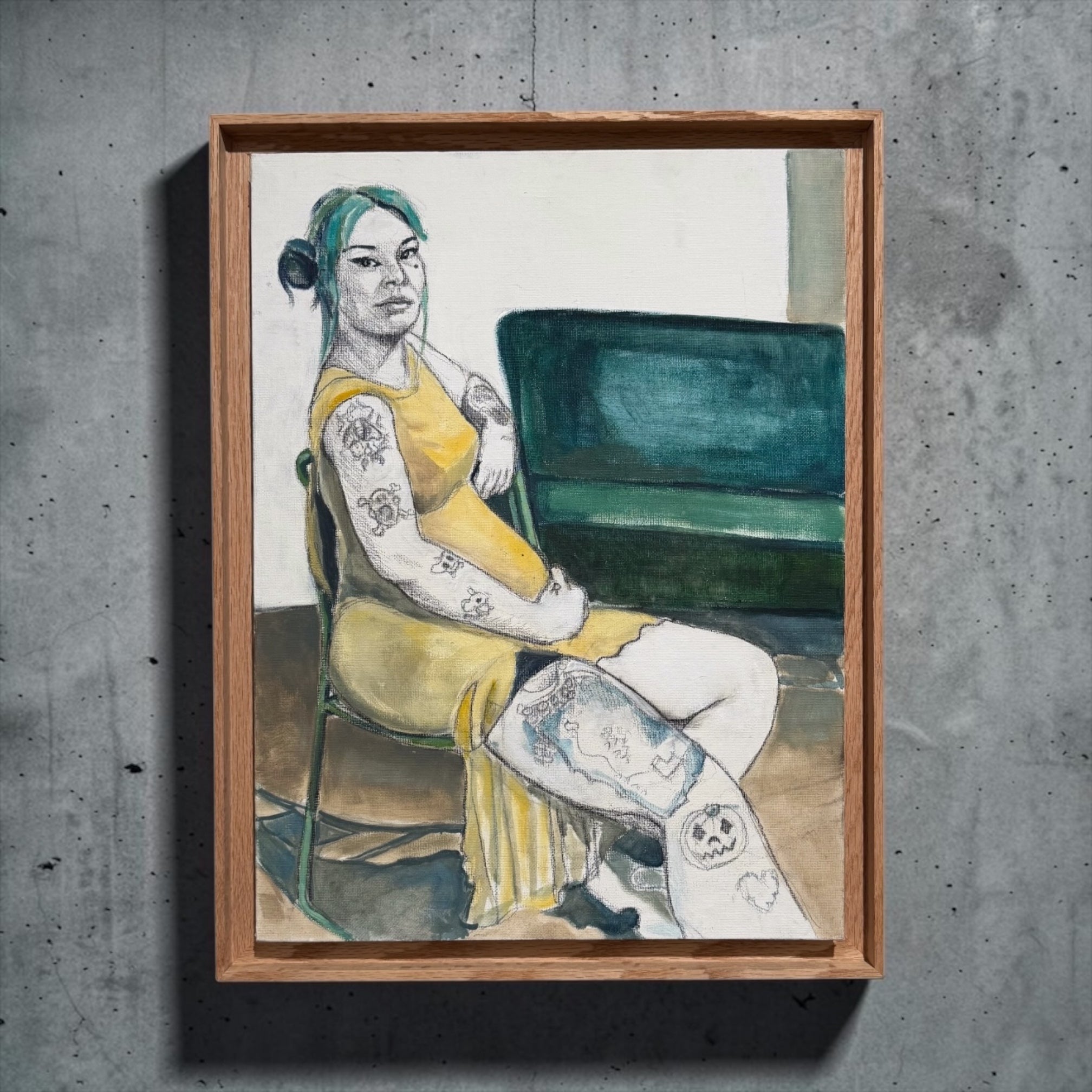 A framed artwork  featuring an oil painting portrait of a tattooed woman in a yellow dress sitting on a chair, displayed on a textured grey concrete wall.