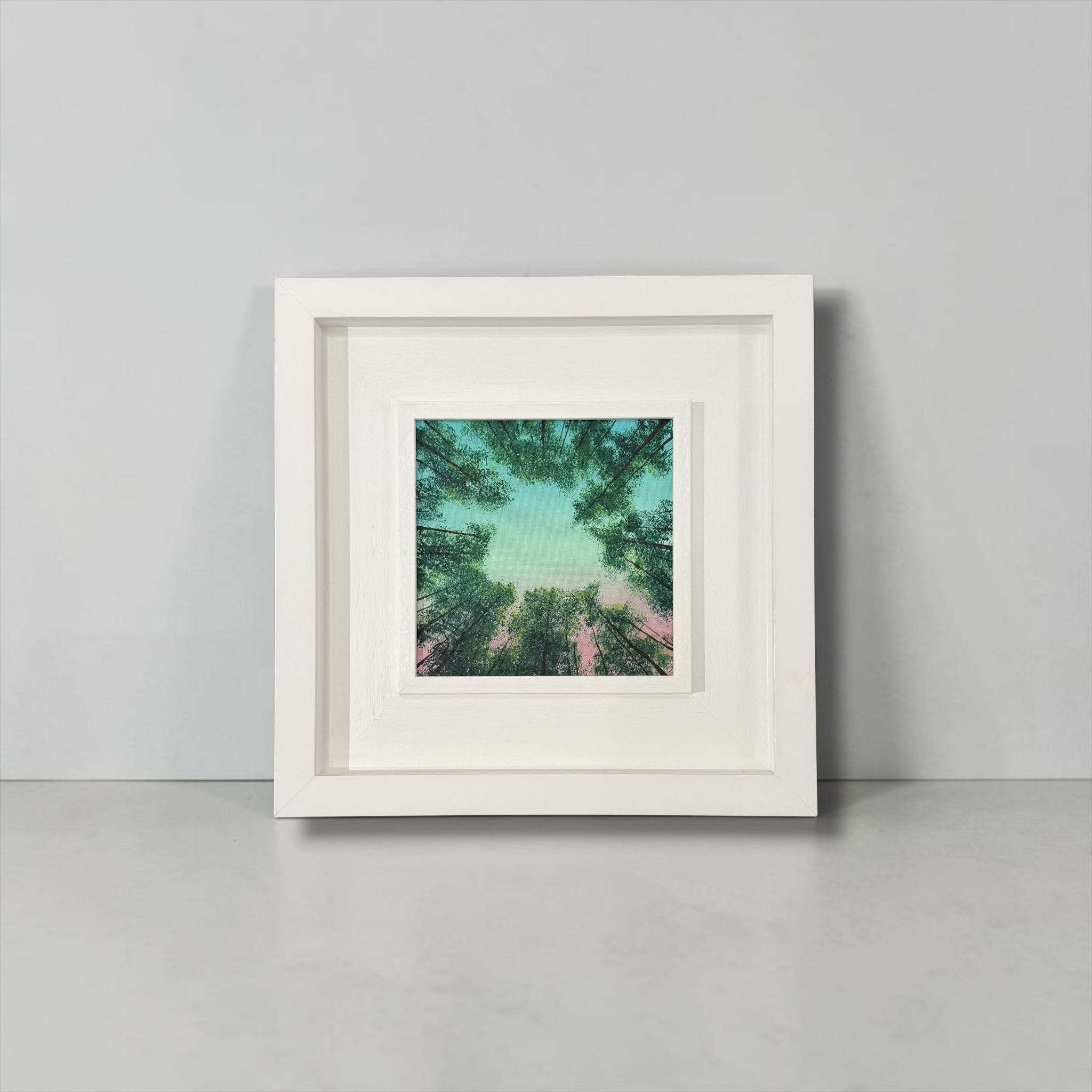 Framed artwork of a forest canopy in shape of a heart, by Vincent Devine