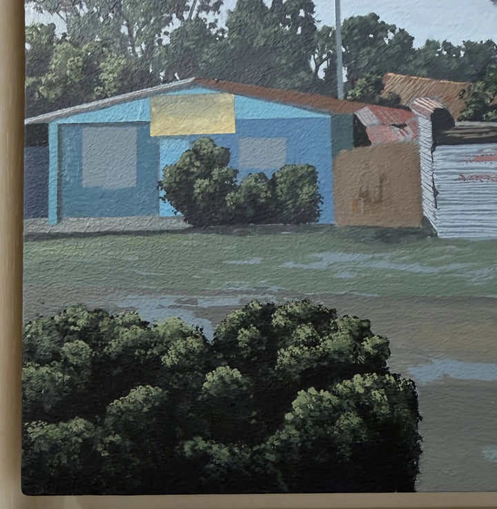 Painting of a blue house with a yellow roof and greenery in the foreground