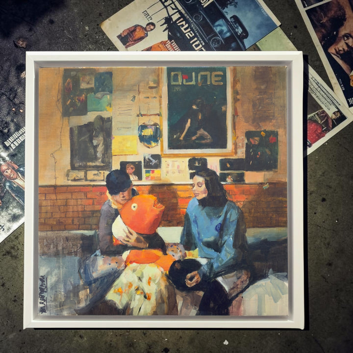 Framed oil painting by Mar Herrera titled "Nemo," featuring a playful orange fish and two figures in a contemporary setting