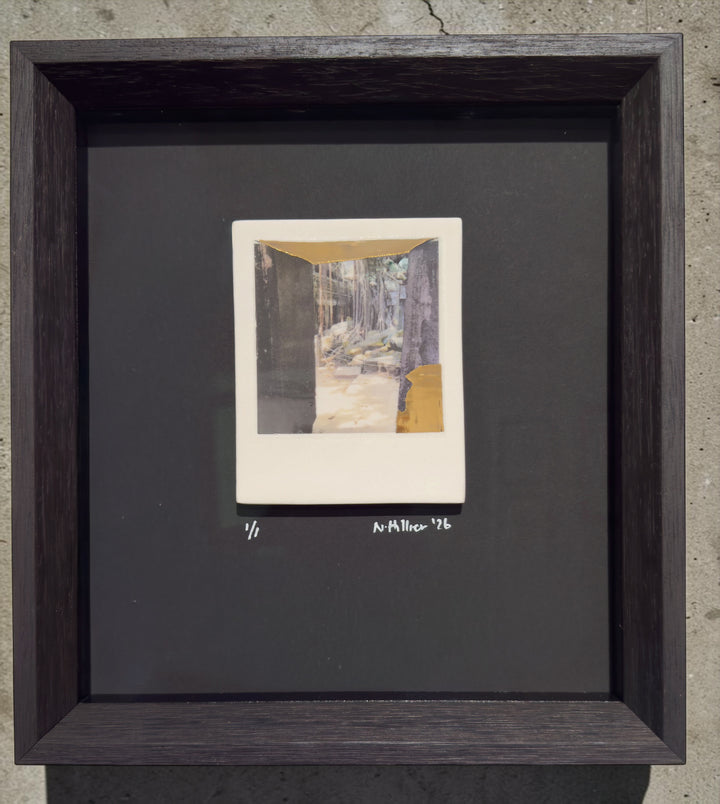 Incised photographic ceramic decal on porcelain titled "Lost Kingdom" by artist Nadia Hillier, featuring a nature scene with real gold application, framed.