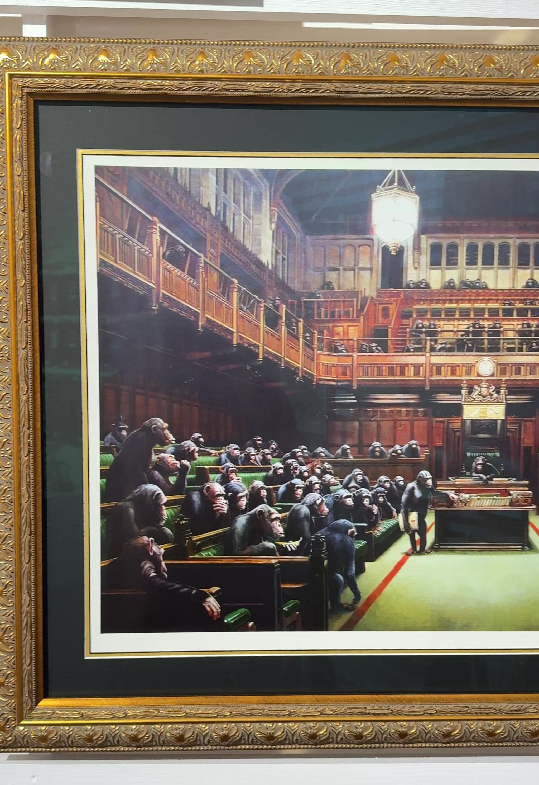 Video of Framed Banksy Monkey Parliament print, iconic political satire street art piece, available for purchase.