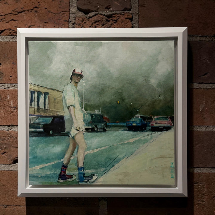 "It Burns" framed painting on a brick wall