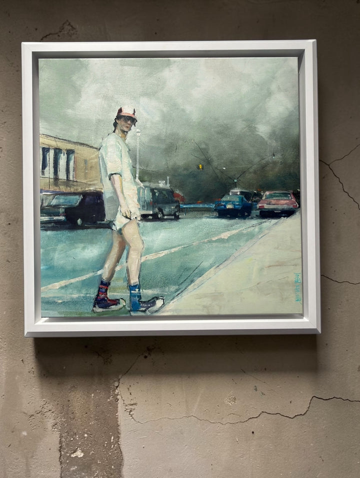 Rare framed figurative oil painting on canvas featuring a lone figure in a moody urban street scene with a white frame.